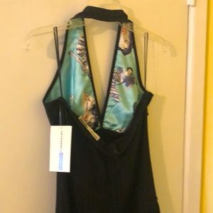 Brand new, black, halter dress with silk lining.